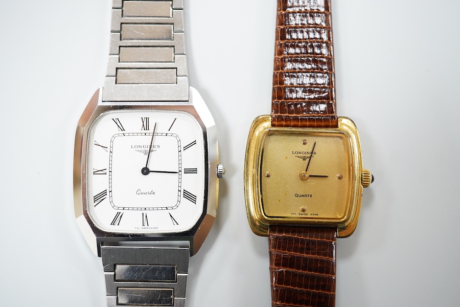 A gentleman's recent stainless steel backed Longines quartz wrist watch, with Roman dial, case diameter 31mm, on a steel bracelet, together with a lady's steel and gold plated Longines quartz wrist watch, case diameter 2